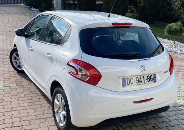 Peugeot 208 cena 27500 przebieg: 71459, rok produkcji 2013 z Jędrzejów małe 407